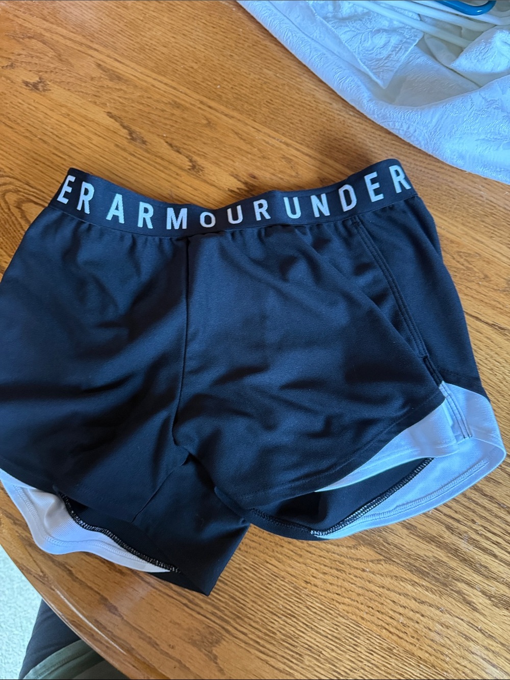 Under Armour Women’s Black Athletic Shorts with White Trim NWOT size small loose
